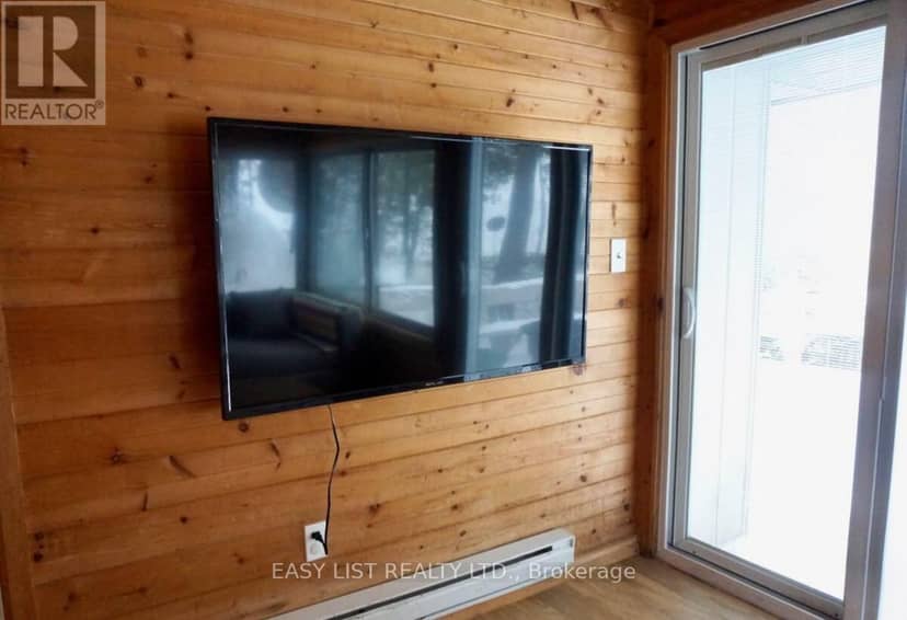 1536 Tiny Beaches Road N — photo 10 of 20