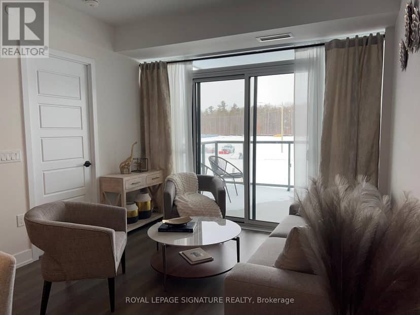 207 - 415 Sea Ray Avenue — photo 2 of 9