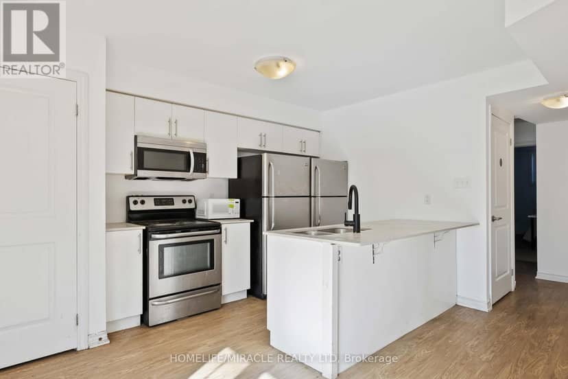 11 - 244 Penetanguishene Road — photo 11 of 35