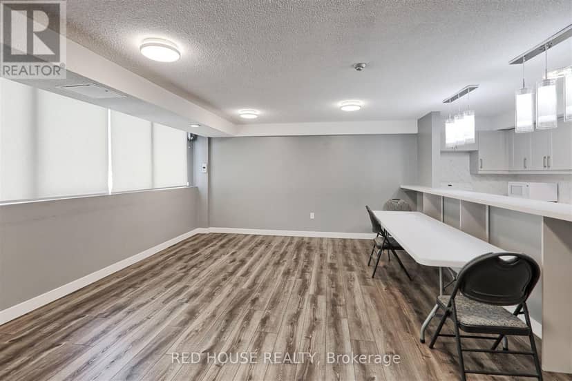 705 - 3590 Kaneff Crescent — photo 35 of 39