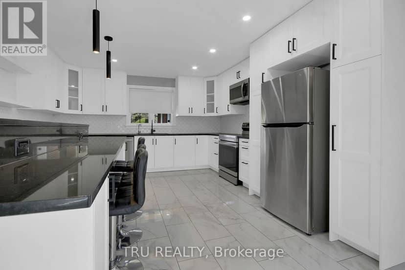 7038 Shields Drive — photo 10 of 40