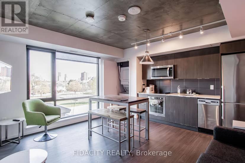 303 - 105 Champagne Avenue S — photo 3 of 24