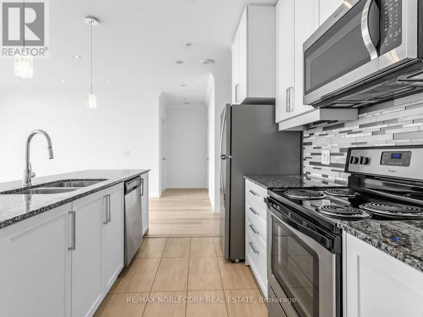 1705 - 840 Queens Plate Drive — photo 15 of 34