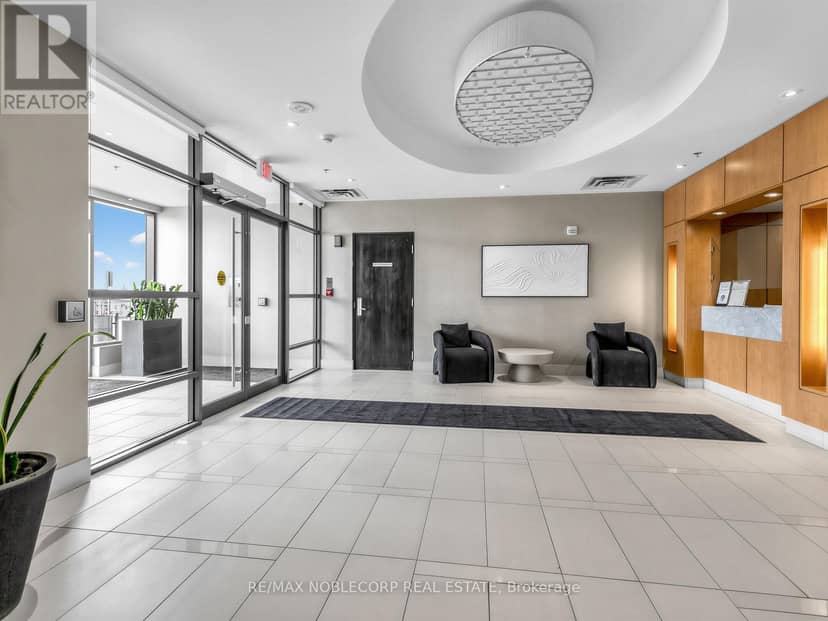 1705 - 840 Queens Plate Drive — photo 3 of 34