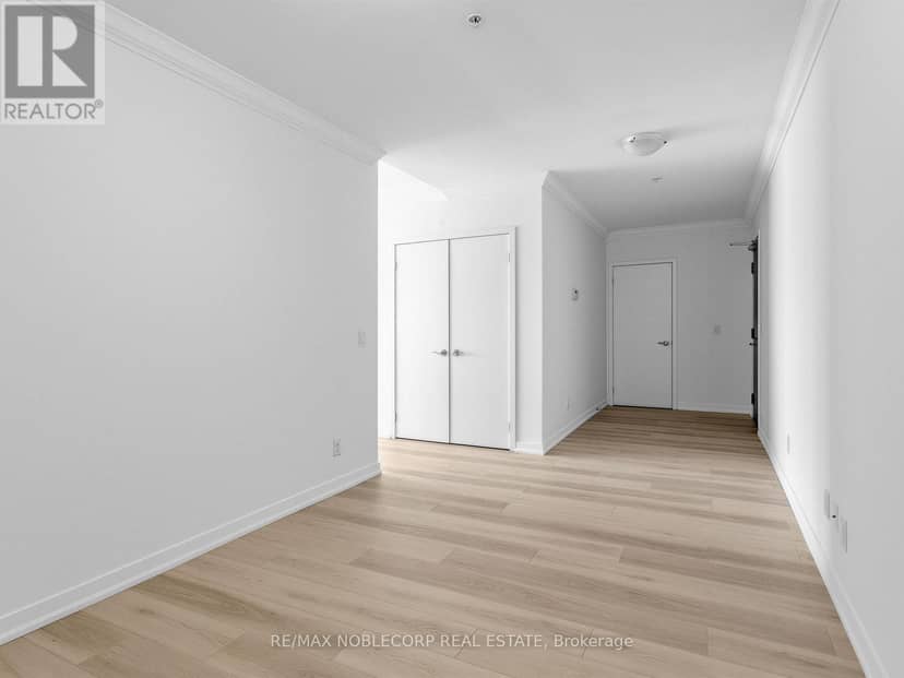 1705 - 840 Queens Plate Drive — photo 7 of 34