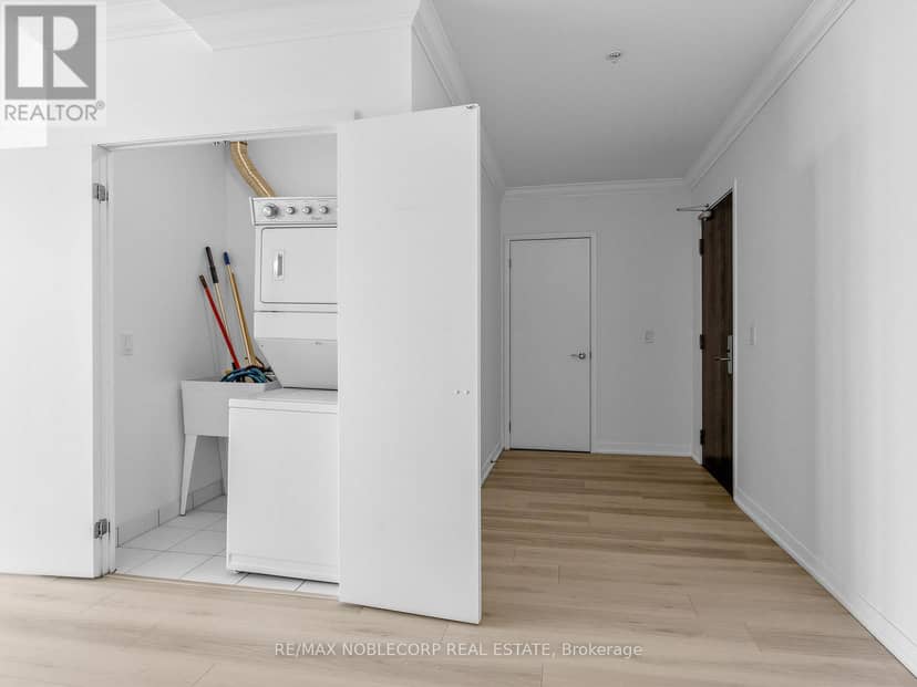 1705 - 840 Queens Plate Drive — photo 9 of 34