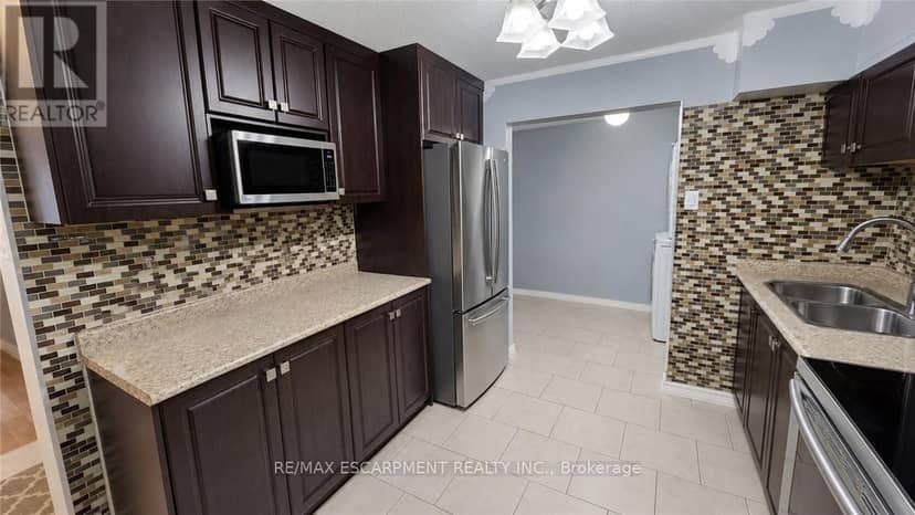 7 - 110 Ling Road — photo 7 of 19