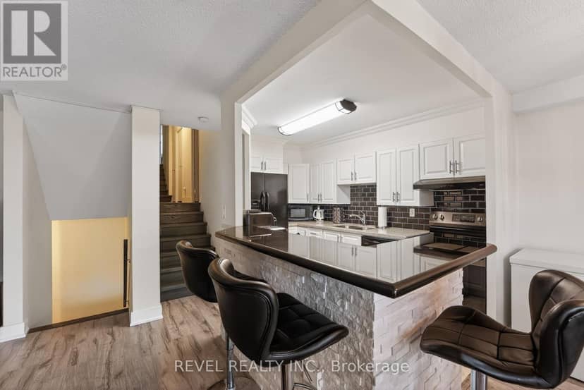 403 - 11 Wincott Drive — photo 3 of 25