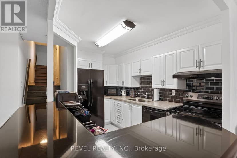 403 - 11 Wincott Drive — photo 5 of 25