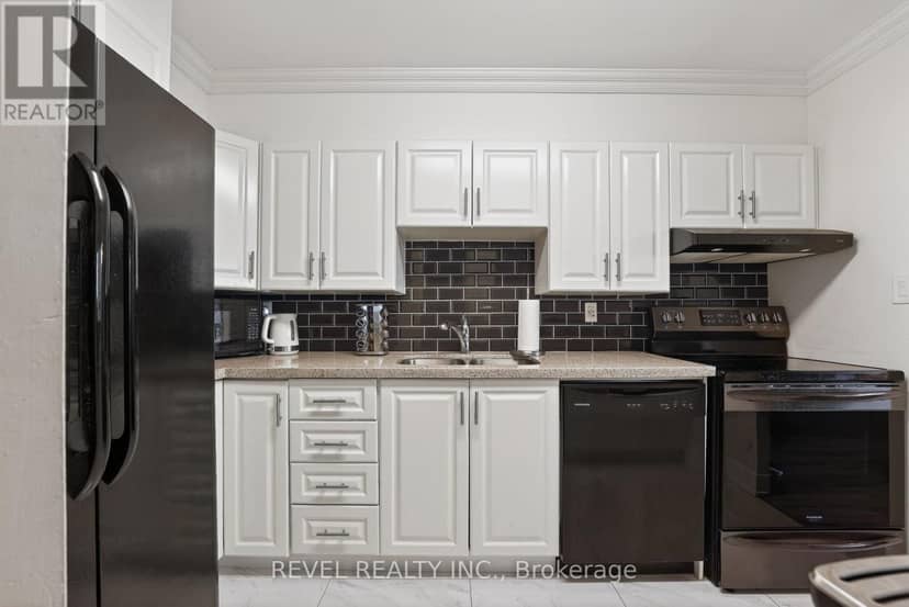 403 - 11 Wincott Drive — photo 7 of 25
