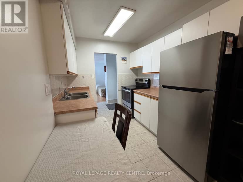 209 - 340 Dixon Road — photo 8 of 18