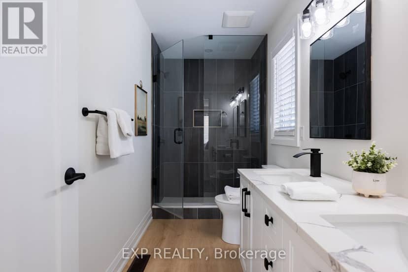 6152 Curlin Crescent — photo 4 of 5