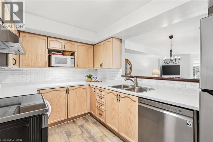 216 PLAINS Road W Unit# A307 — photo 5 of 35