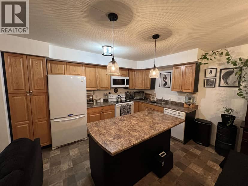 7 4620 E 52 AVENUE, Fort Nelson, photo 5