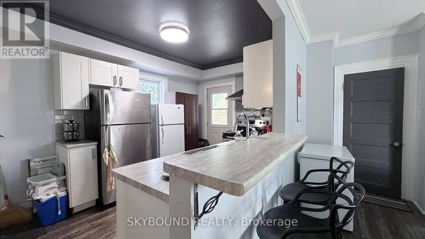 4890 Saint Clair Avenue — photo 12 of 21