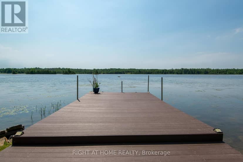 203 McGuire Beach Road — photo 1 of 33