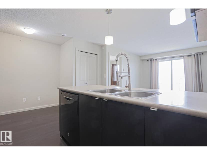 #411 3353 16A AV NW — photo 18 of 32