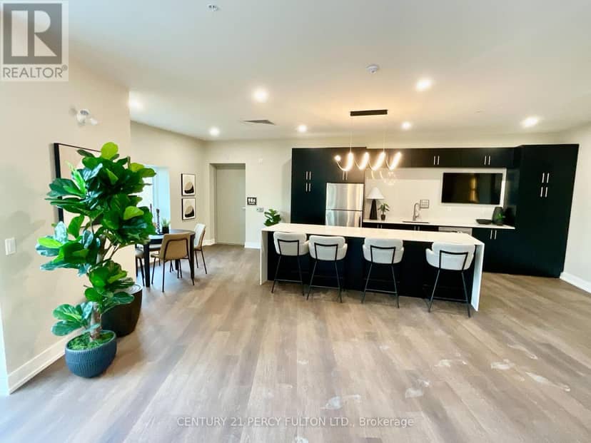 303 - 1100 Lackner Place — photo 3 of 23