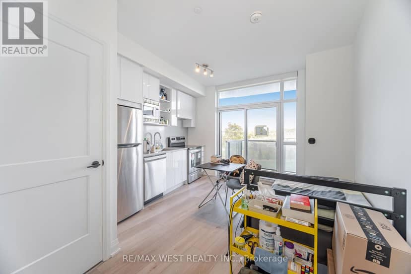 218 - 60 George Butchart Drive — photo 10 of 33