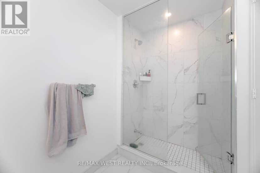 218 - 60 George Butchart Drive — photo 18 of 33
