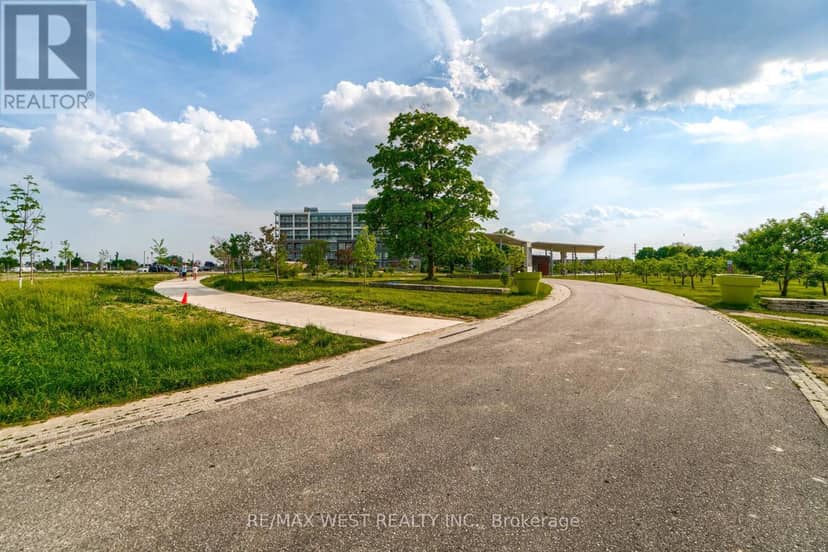 218 - 60 George Butchart Drive — photo 29 of 33
