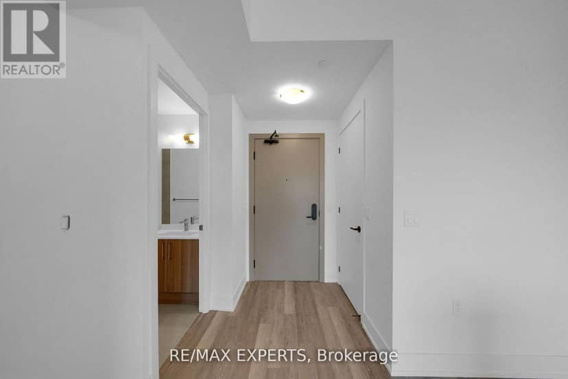 203 - 2075 King Road — photo 2 of 40