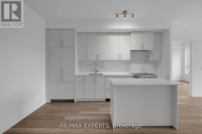 203 - 2075 King Road — photo 4 of 40
