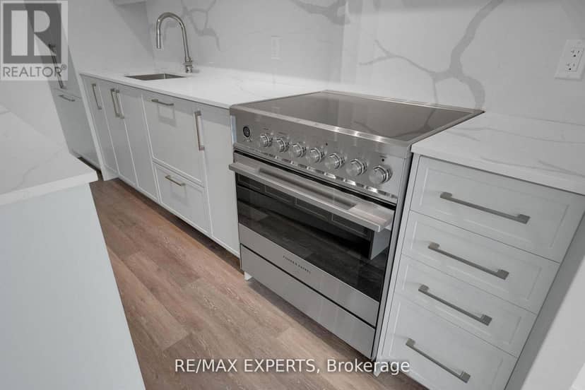 203 - 2075 King Road — photo 8 of 40