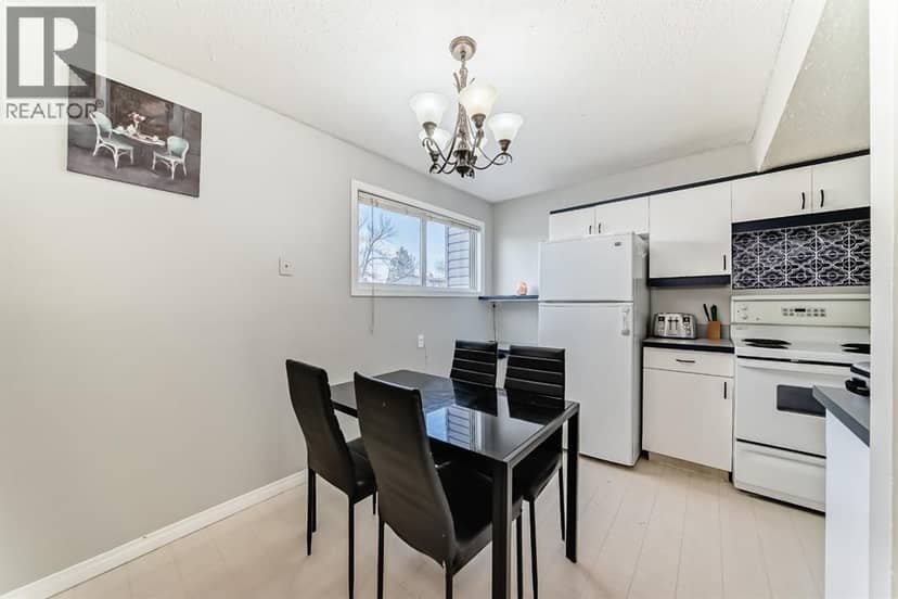 702, 9930 Bonaventure Drive SE — photo 12 of 38