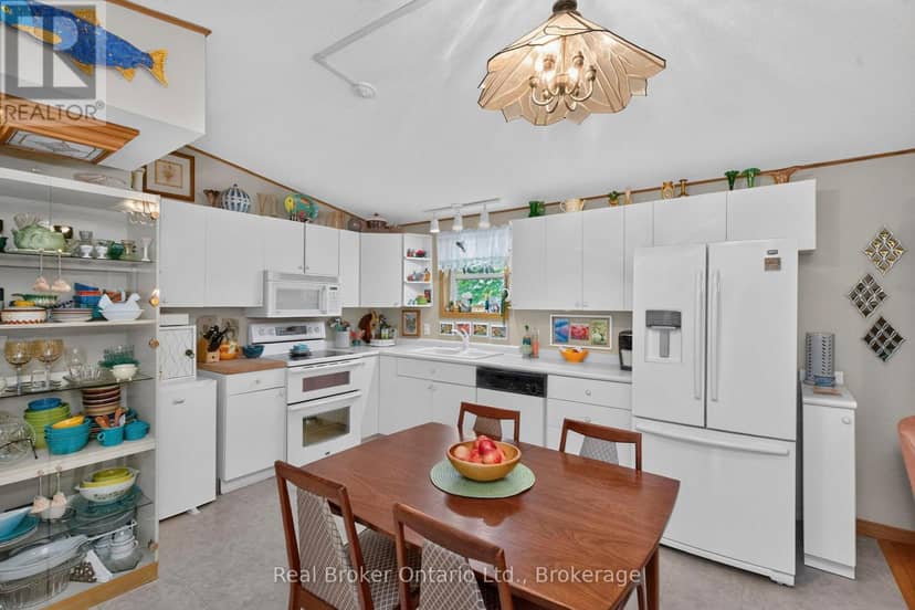 5 - 5411 Elliott Side Road — photo 11 of 29