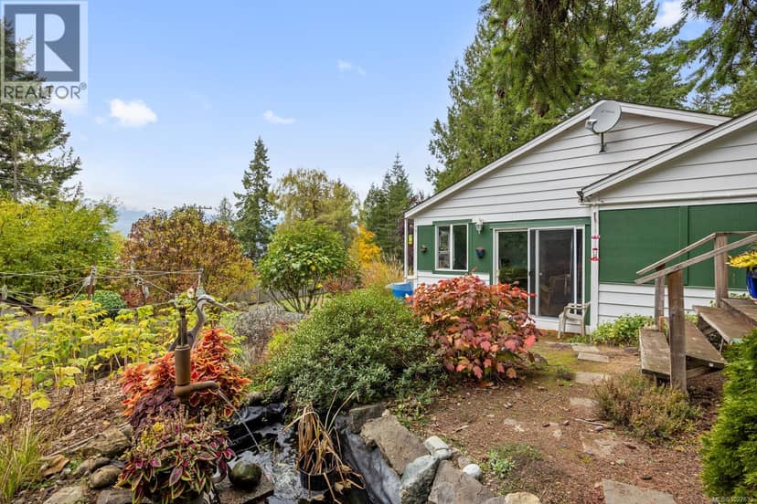 3296 Denman Rd — photo 1 of 40