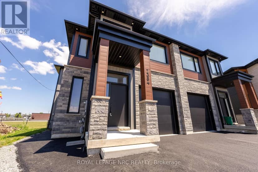 7384 Splendour Drive — photo 1 of 39