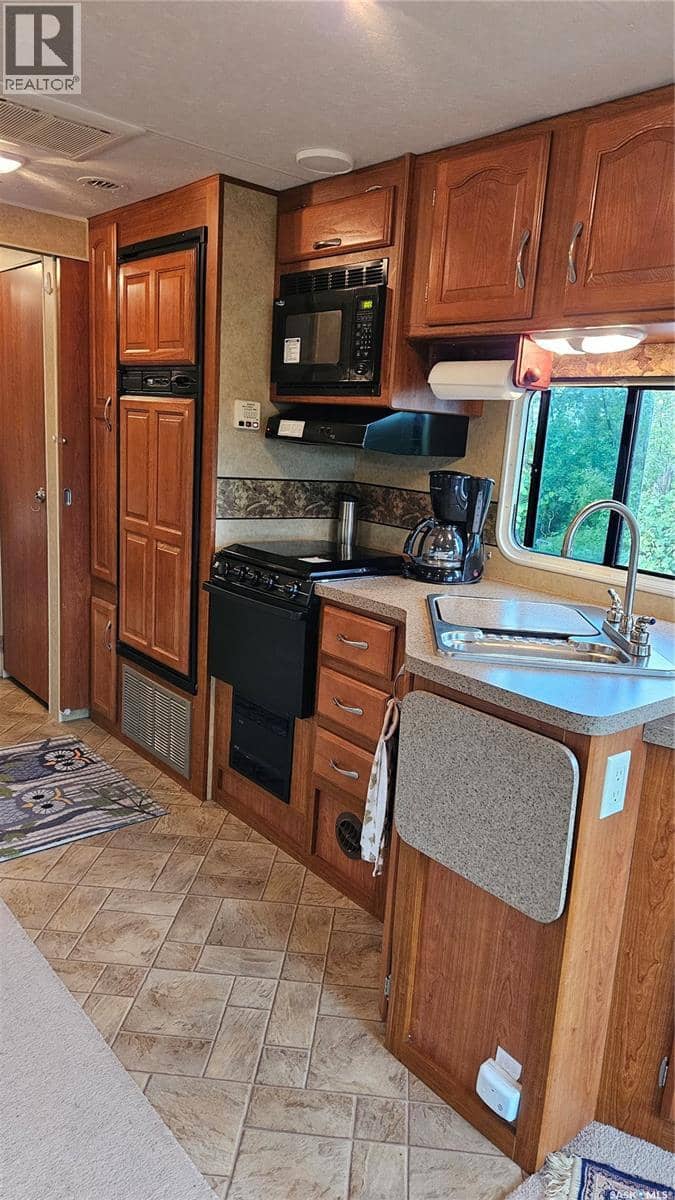 102 Enchanted Loop Deep Woods RV Campground, Wakaw Lake, photo 2