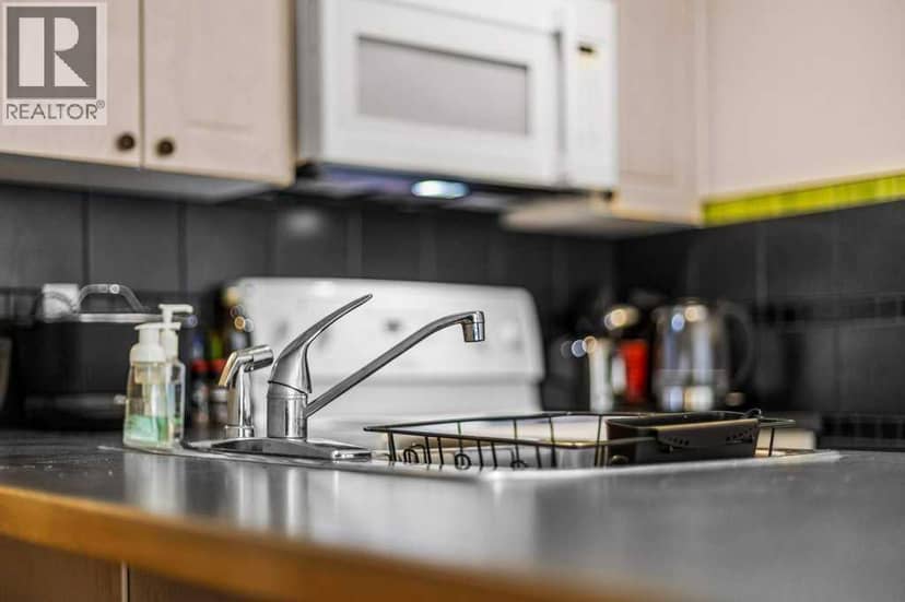 211, 176 Kananaskis Way — photo 36 of 37