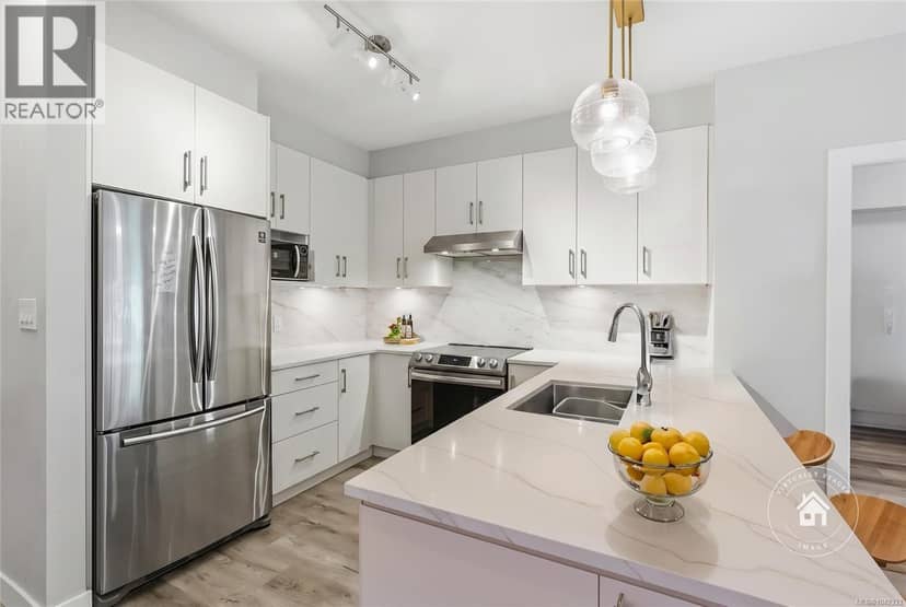 308 20 Barsby Ave — photo 1 of 34
