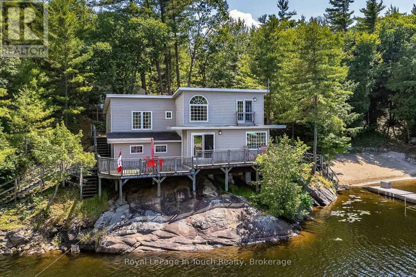 9794 Georgian Bay Shore N — photo 1 of 40