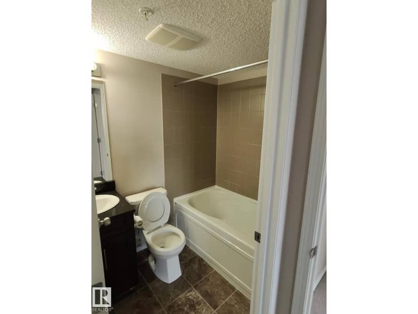 #303 1060 McConachie Bv NW — photo 10 of 13