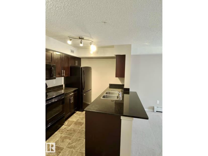 #303 1060 McConachie Bv NW — photo 11 of 13