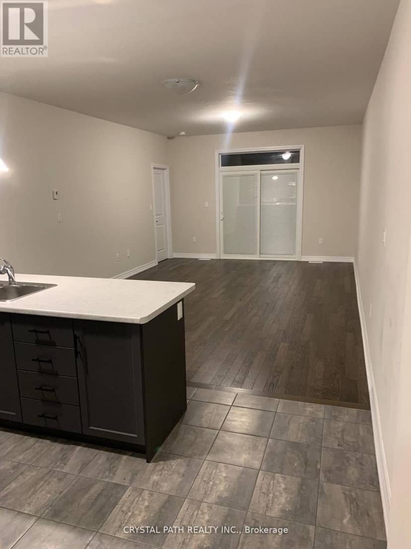 52 - 4311 Mann Street — photo 4 of 9