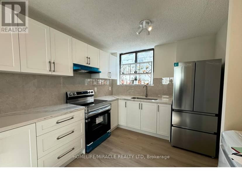 303 - 665 Kennedy Road — photo 2 of 26