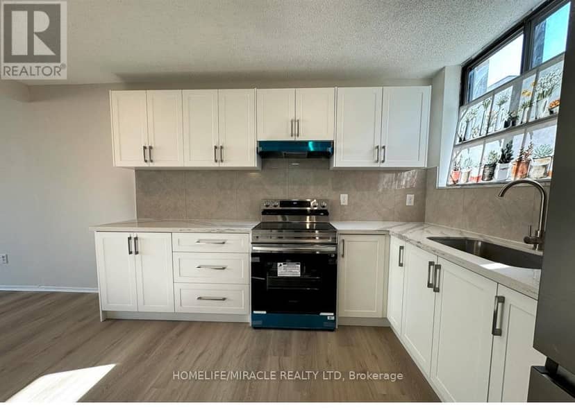 303 - 665 Kennedy Road — photo 3 of 26