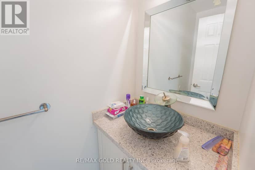 107 - 900 Central Park Drive — photo 17 of 29