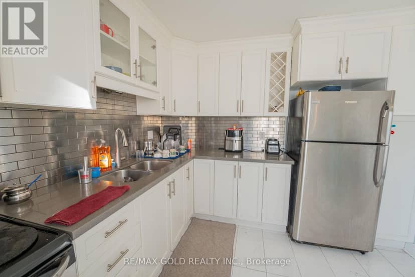 107 - 900 Central Park Drive — photo 9 of 29