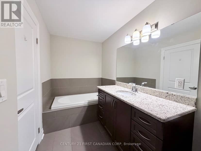 504 - 240 Villagewalk Boulevard — photo 17 of 31