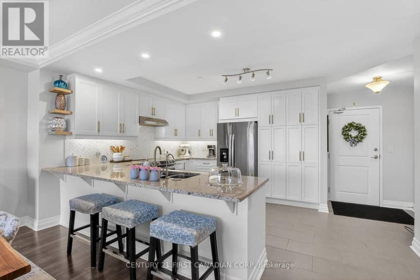 208 - 260 Villagewalk Boulevard — photo 1 of 40