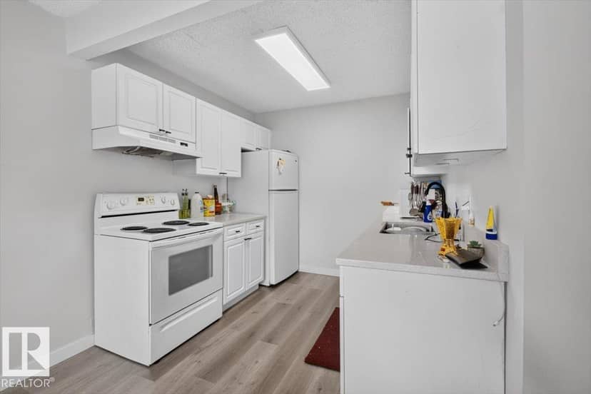 1096 Millbourne Rd E NW — photo 9 of 39