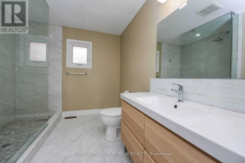 63 Lord Simcoe Drive — photo 23 of 29