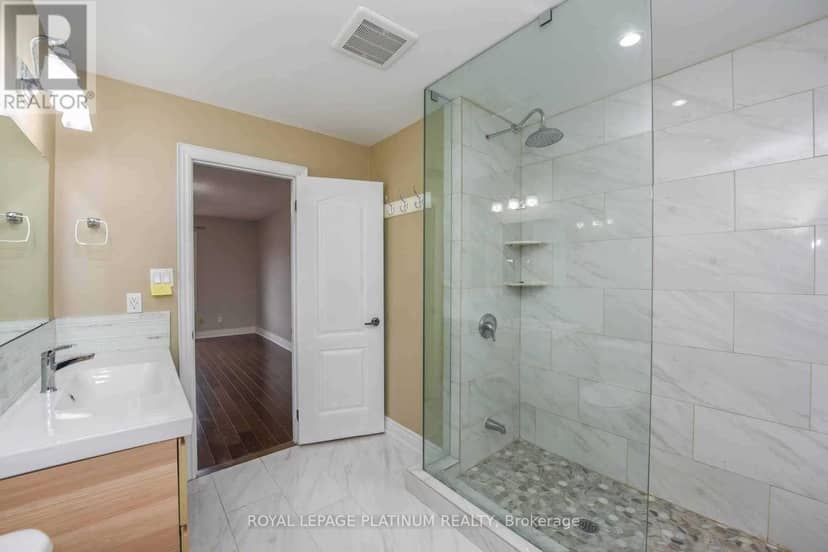 63 Lord Simcoe Drive — photo 25 of 29