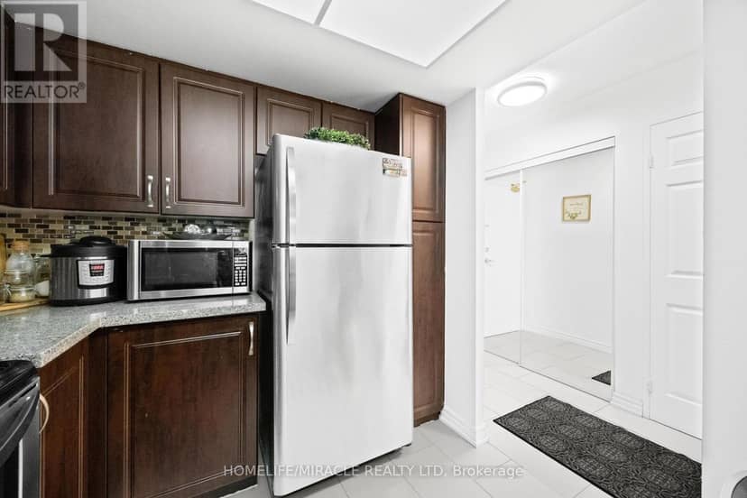 406 - 325 Webb Drive — photo 8 of 36