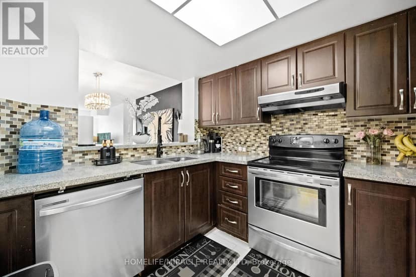 406 - 325 Webb Drive — photo 9 of 36